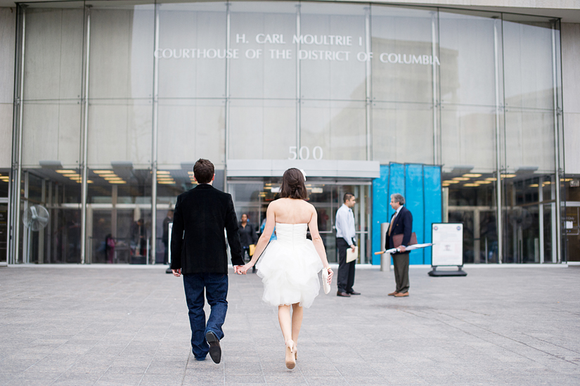 bride and groom walking to dc courthouse