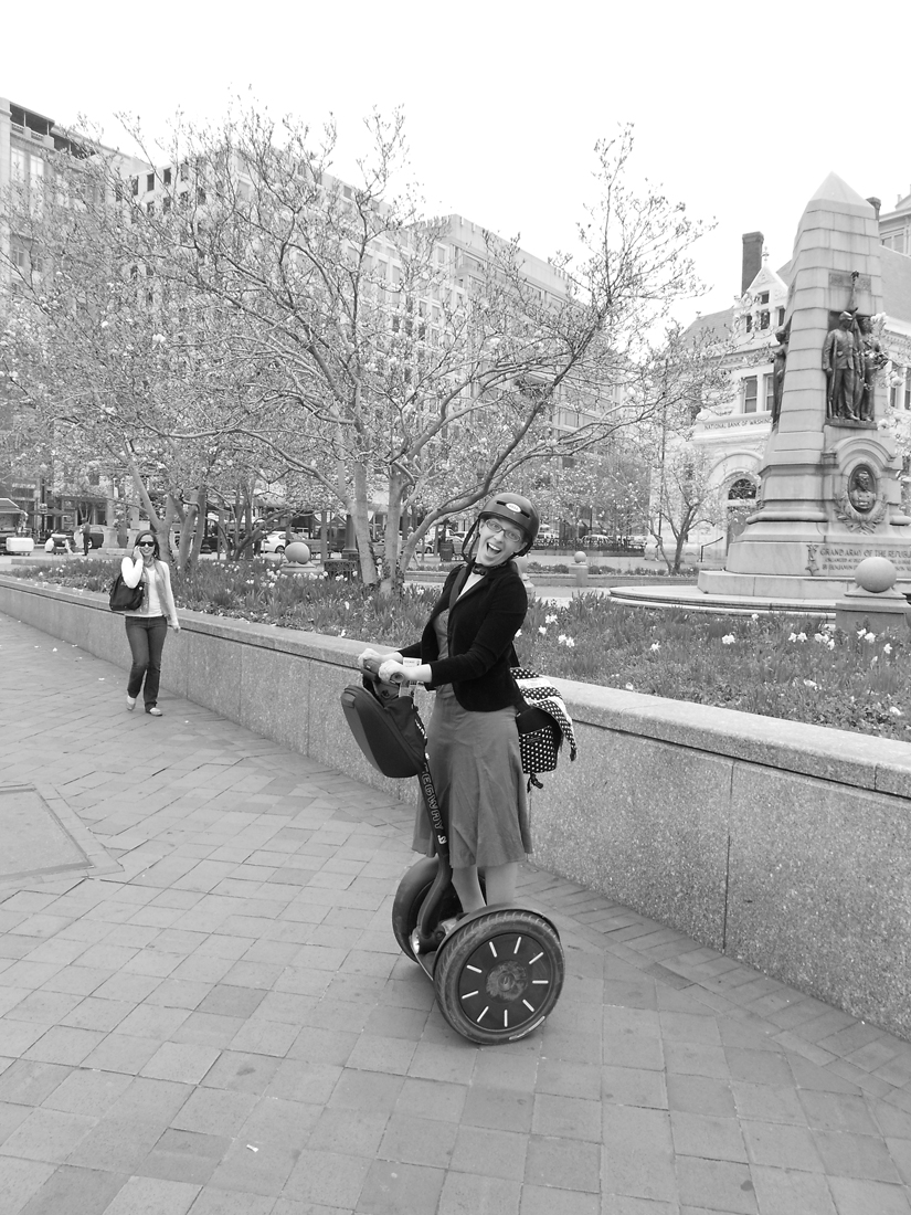 nerdy photographer girl on a segway