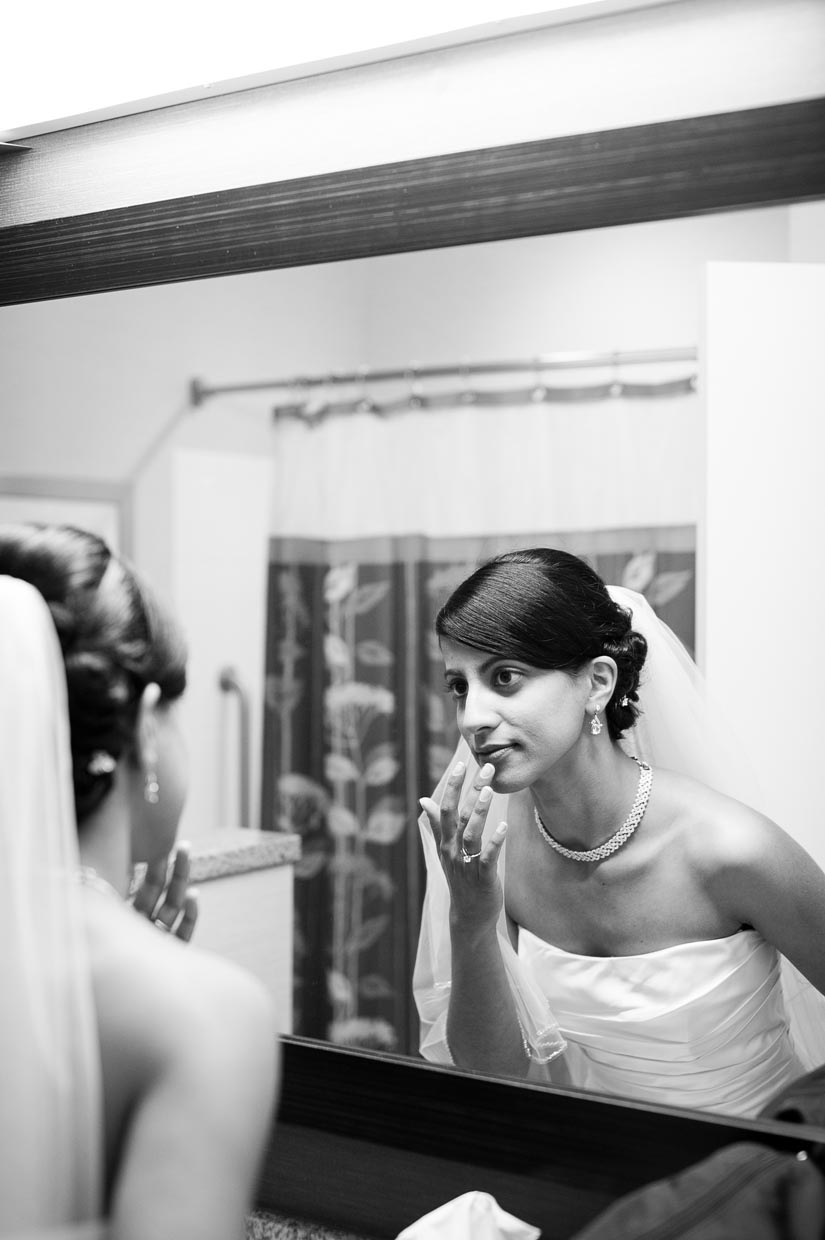 bride puts on lipstick