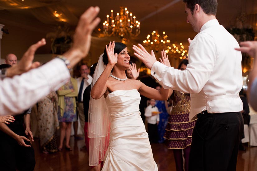 bride and groom dancing during their wedding reception