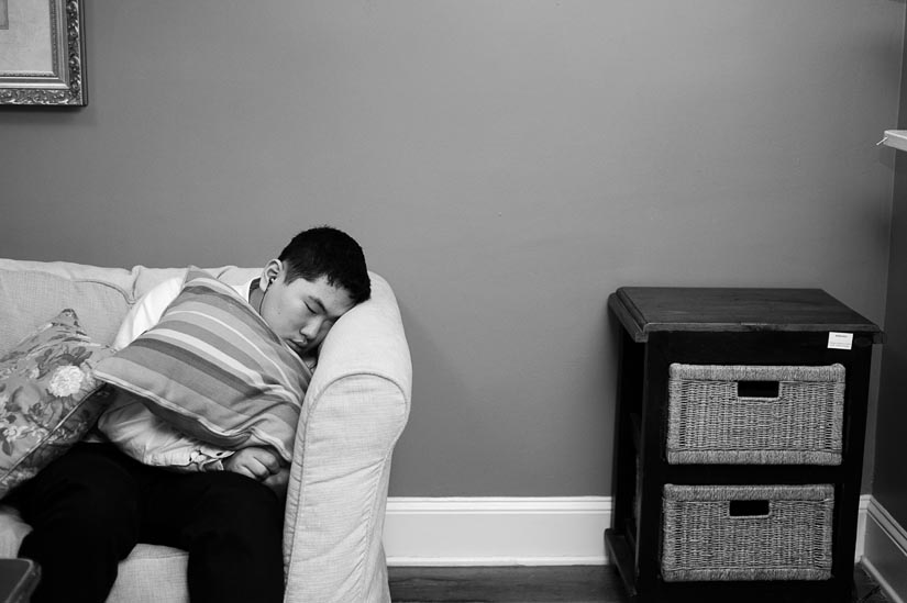 boy sleeping during the wedding reception