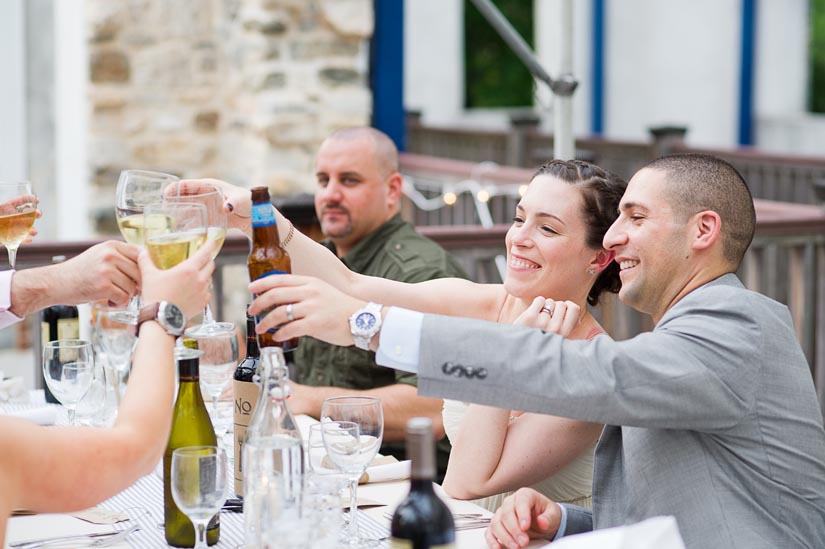 bride and groom toasting at patapsco female institute wedding reception