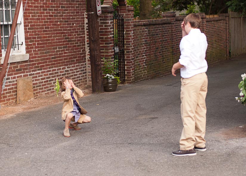 little boy gets hit by a lizard at a wedding