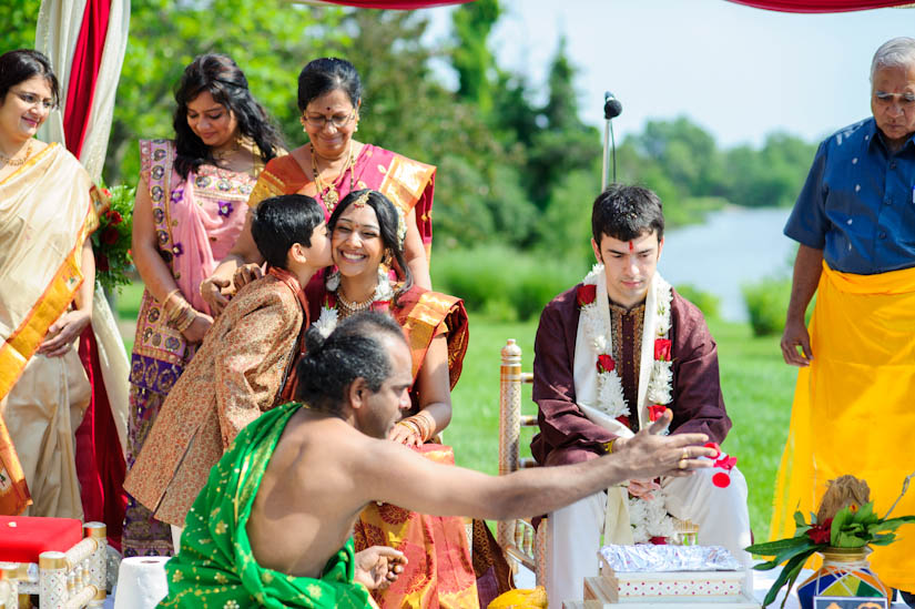 nephew gives a kiss at the indian wedding ceremony