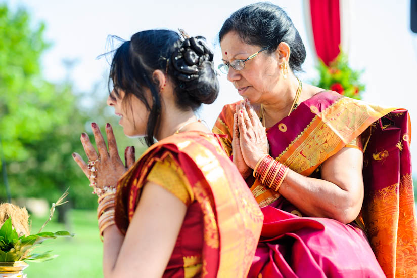 mother of the bride and bride during indian wedding