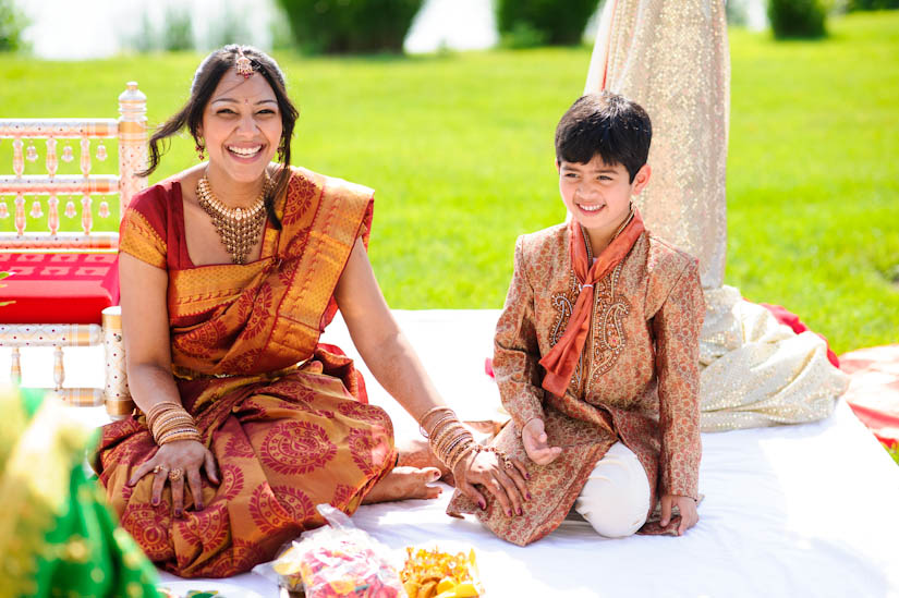bride and her nephew at the indian wedding ceremony