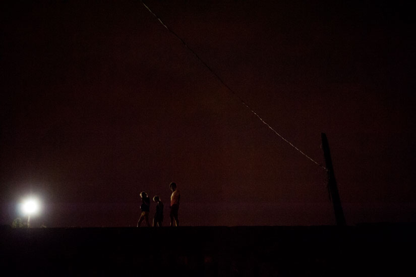 people by the georgetown canals at night