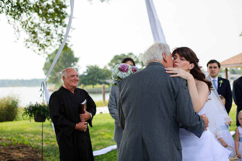 kissing father before wedding ceremony