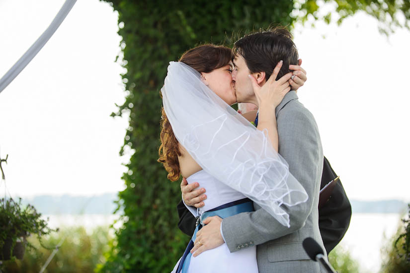 first kiss at backyard wedding