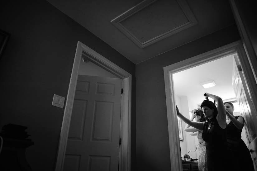 bride and bridesmaids getting ready at home