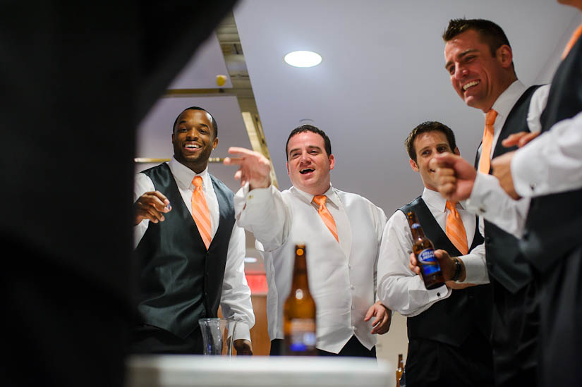 groom plays beer pong at levine museum of the new south