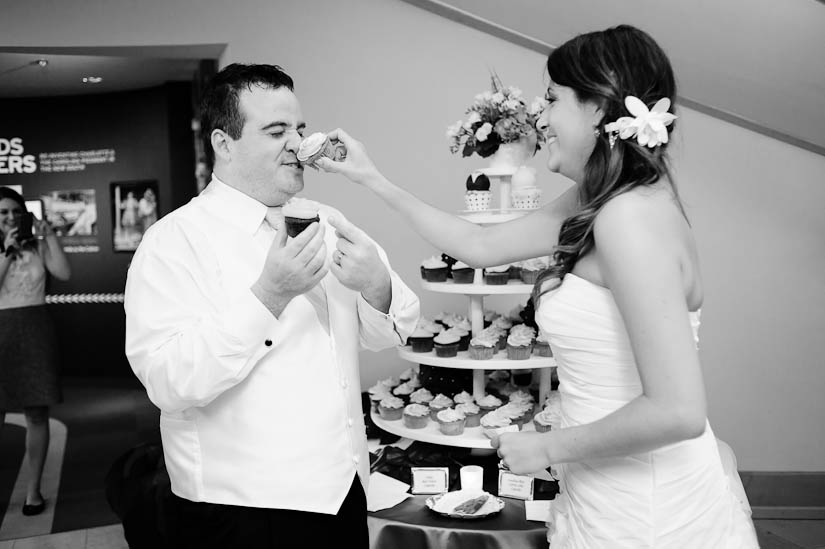 smashing cupcakes during levine museum of the new south destination wedding