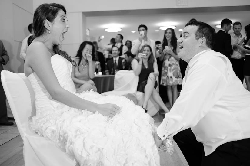 getting the garter at levine museum of the new south wedding