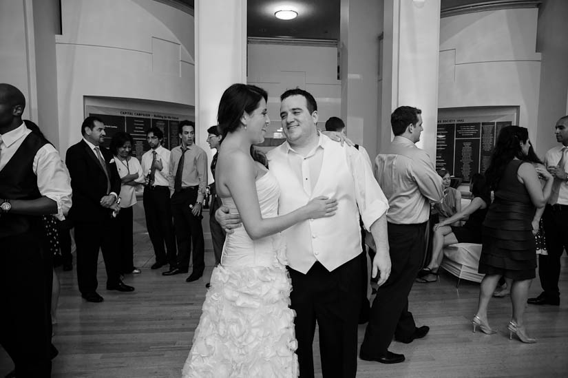 bride and groom at the end of the levine museum of the new south destination wedding