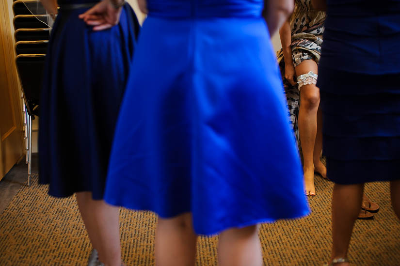 bride puts on garter at levine museum