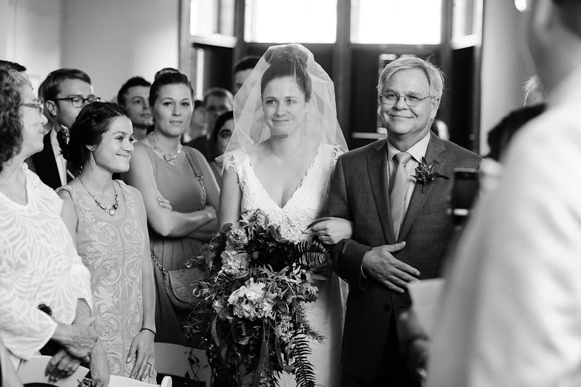 bride walking down the aisle with her dad at arts club of washington