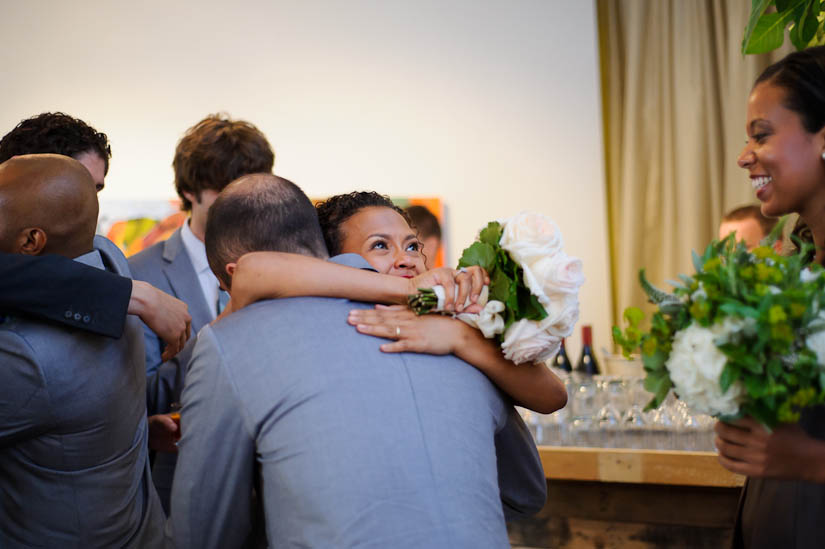 hugging after wedding ceremony at longview gallery