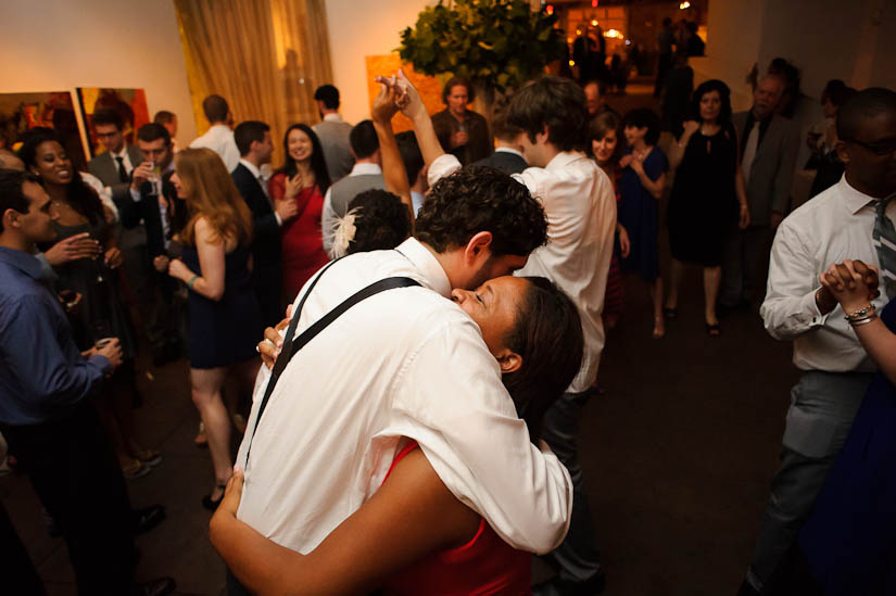 hugging during the wedding reception at longview gallery