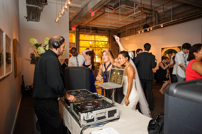 bride and maid of honor rockin' with the dj at longview gallery wedding