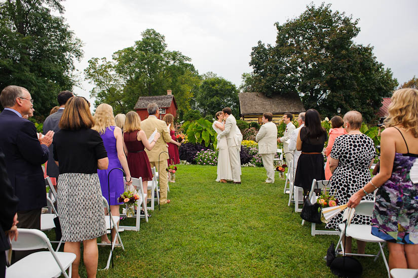 first kiss at woodlawn manor wedding ceremony