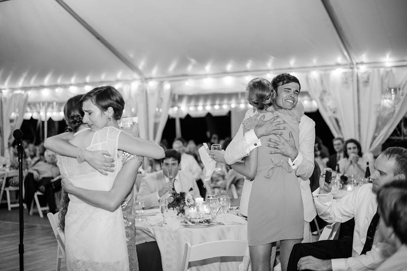 dual hugs at woodlawn manor wedding reception