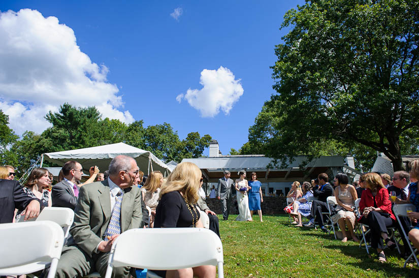 walking down the aisle at mountain lakes house wedding