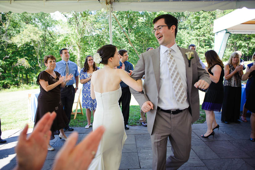 dancing the hora at mountain lakes house wedding