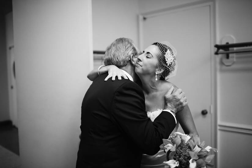 bride with her dad before she walks down the aisle