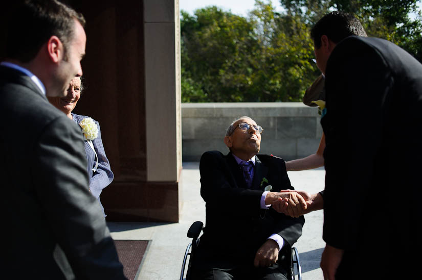 father of the groom greeting guests at saint sophia greek orthodox church