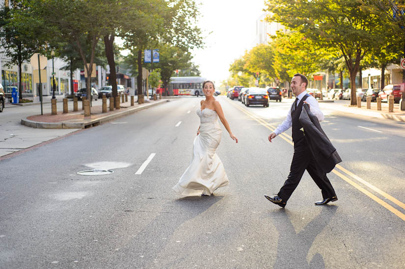 crossing the street in bridal attire