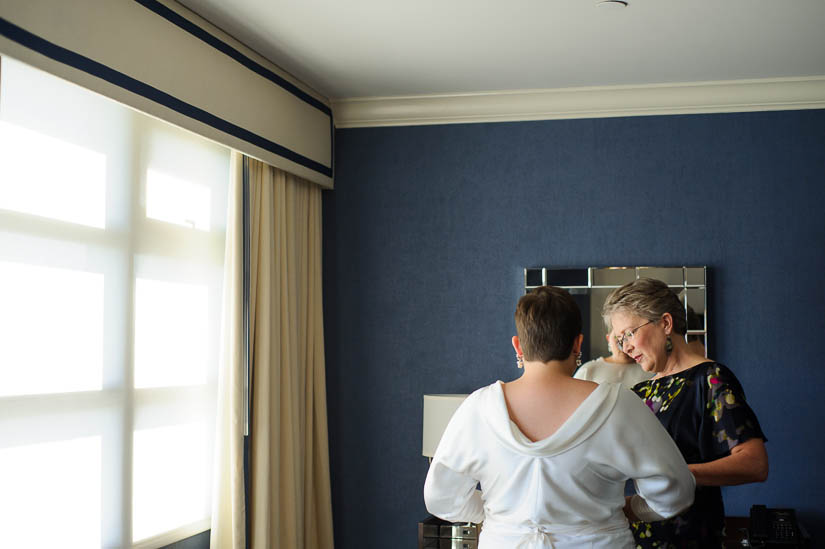 bride and her mom getting ready