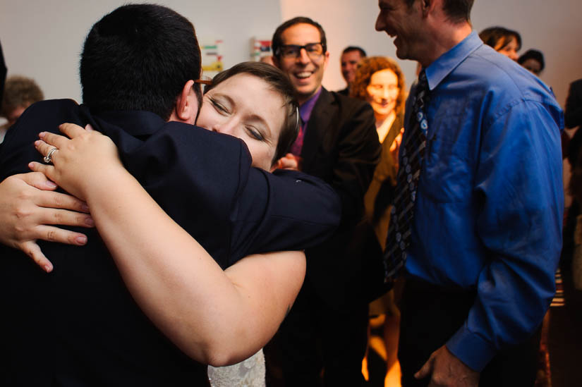 hugging after the hora at longview gallery wedding