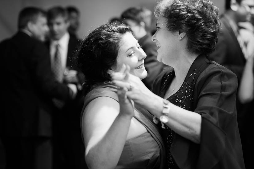 groom's sister and mother dancing at longview gallery wedding