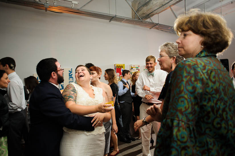 bride and groom laughing at longview gallery wedding