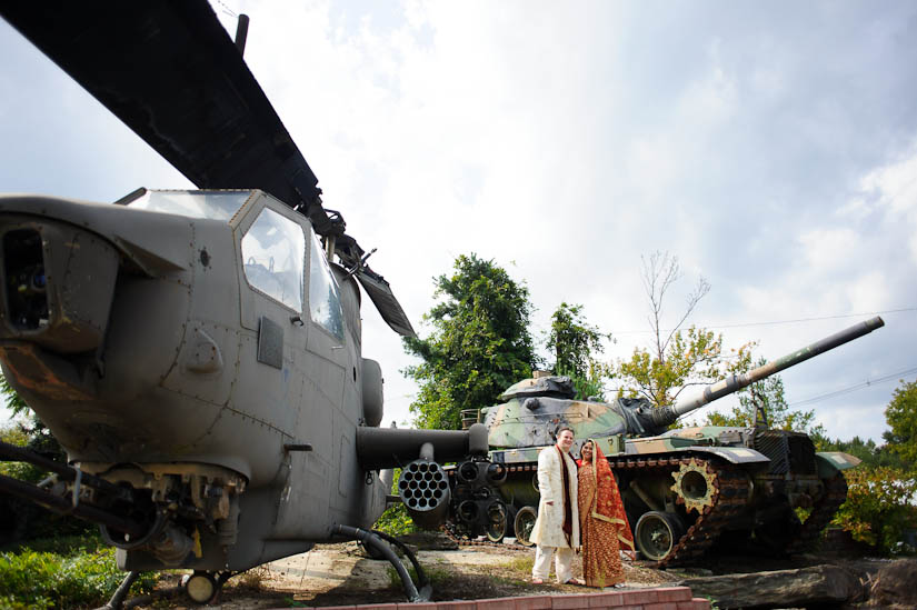 bridal portraits with helicopter and tank