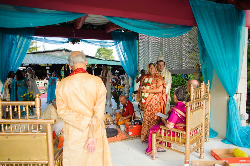 bride and groom circling the coals at garden falls indian wedding