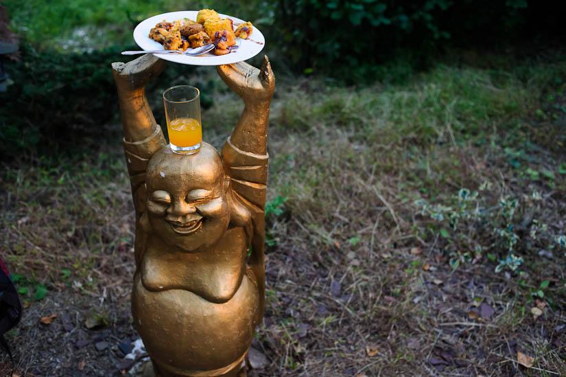 buddha holding a plate of food