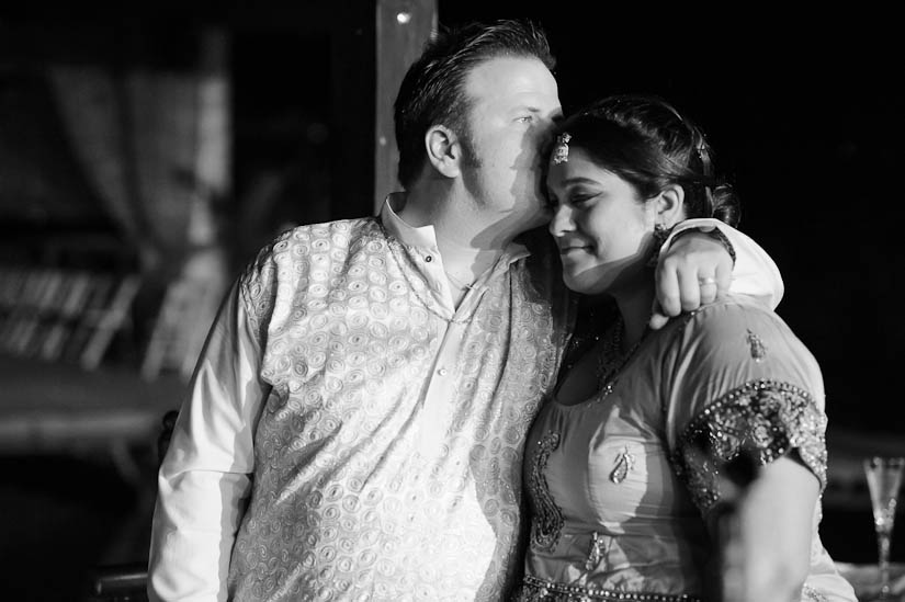 touching moment between bride and groom