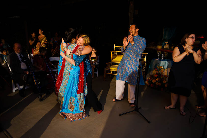 big hugs at garden falls indian wedding
