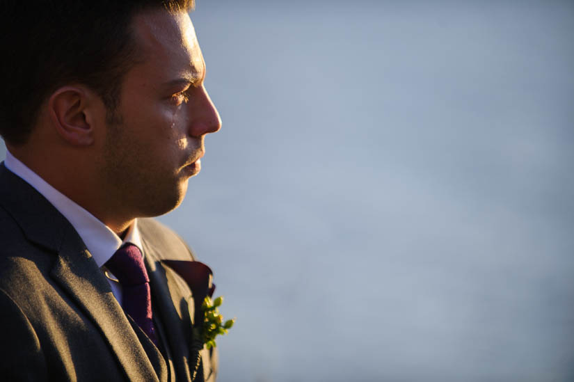 groom crying during wedding ceremony