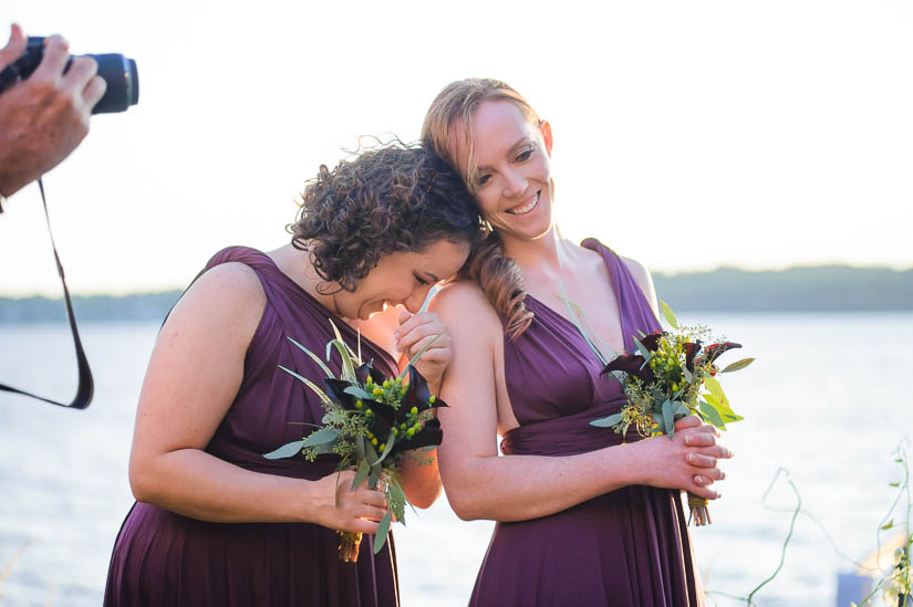 bridesmaids tearing up at wedding ceremony