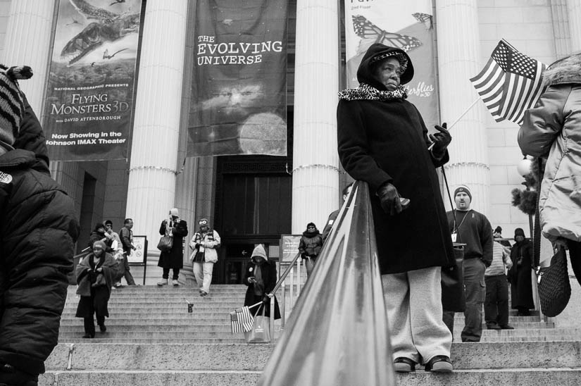 lady watching the inauguration proceedings from the natural history museum