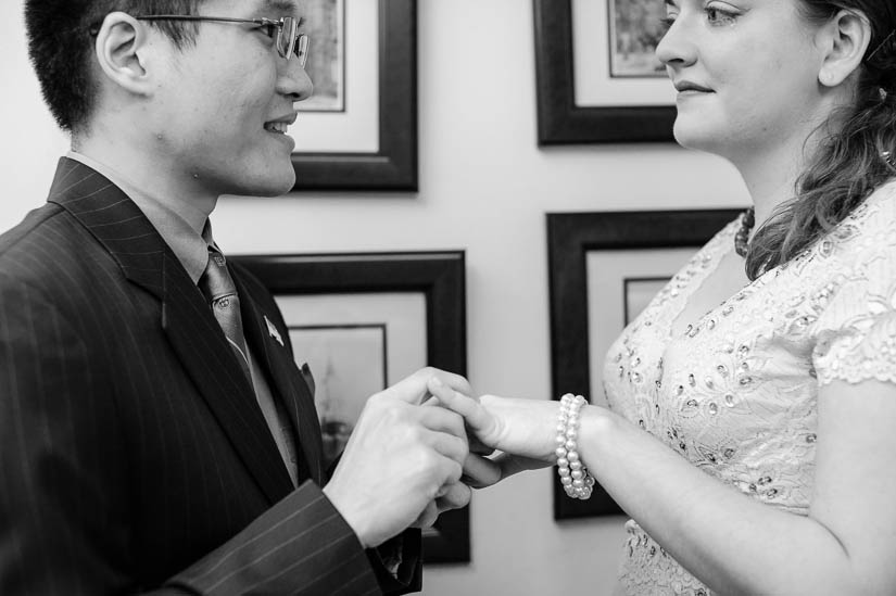 exchanging rings at arlington courthouse wedding