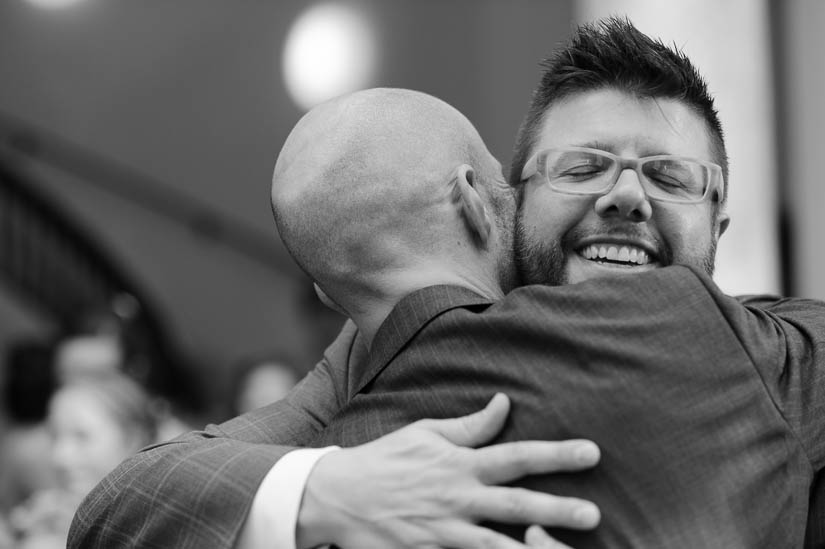 groom greeting guests at carnegie institution for science wedding