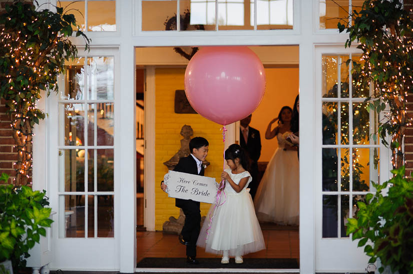 here comes the bride sign at a wedding