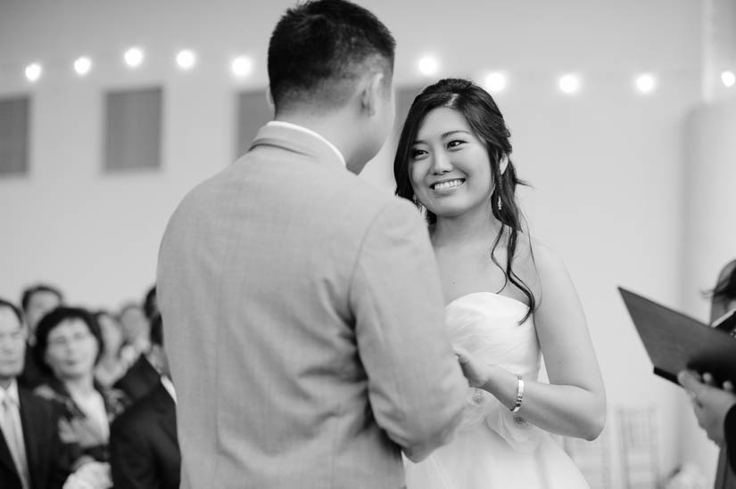 bride and groom during the ring exchange at raspberry plain