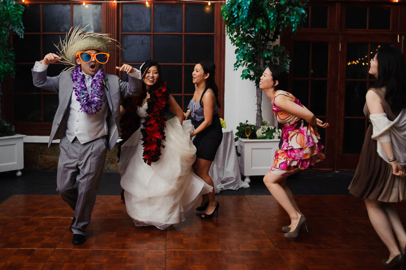 groom leads the conga line at raspberry plain wedding