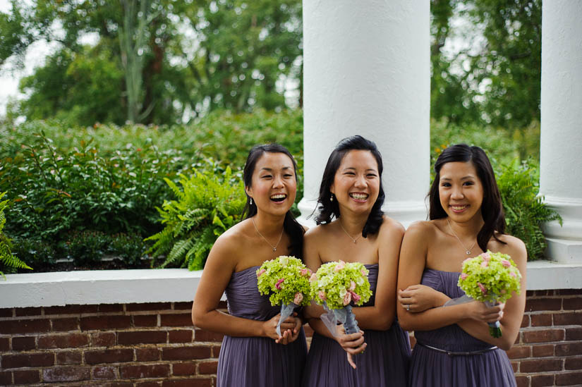 bridesmaids laughing on the porch of raspberry plain
