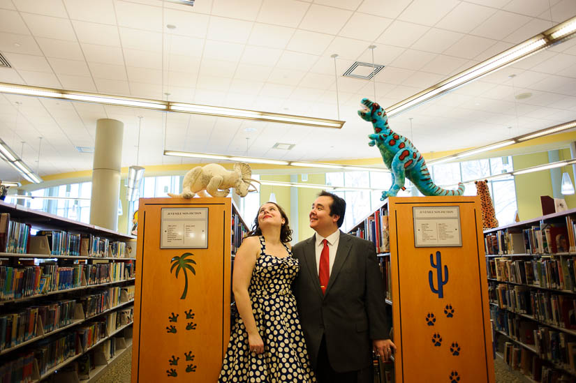 wedding photography in a library with dinosaurs