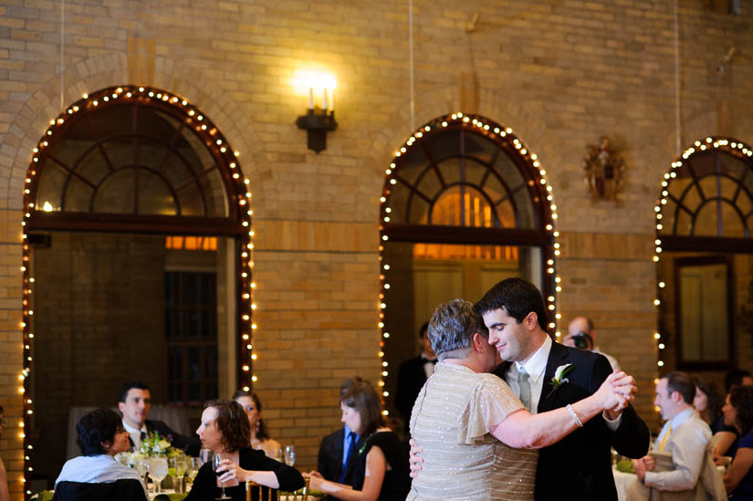 groom and his mother dancing at st. francis hall wedding